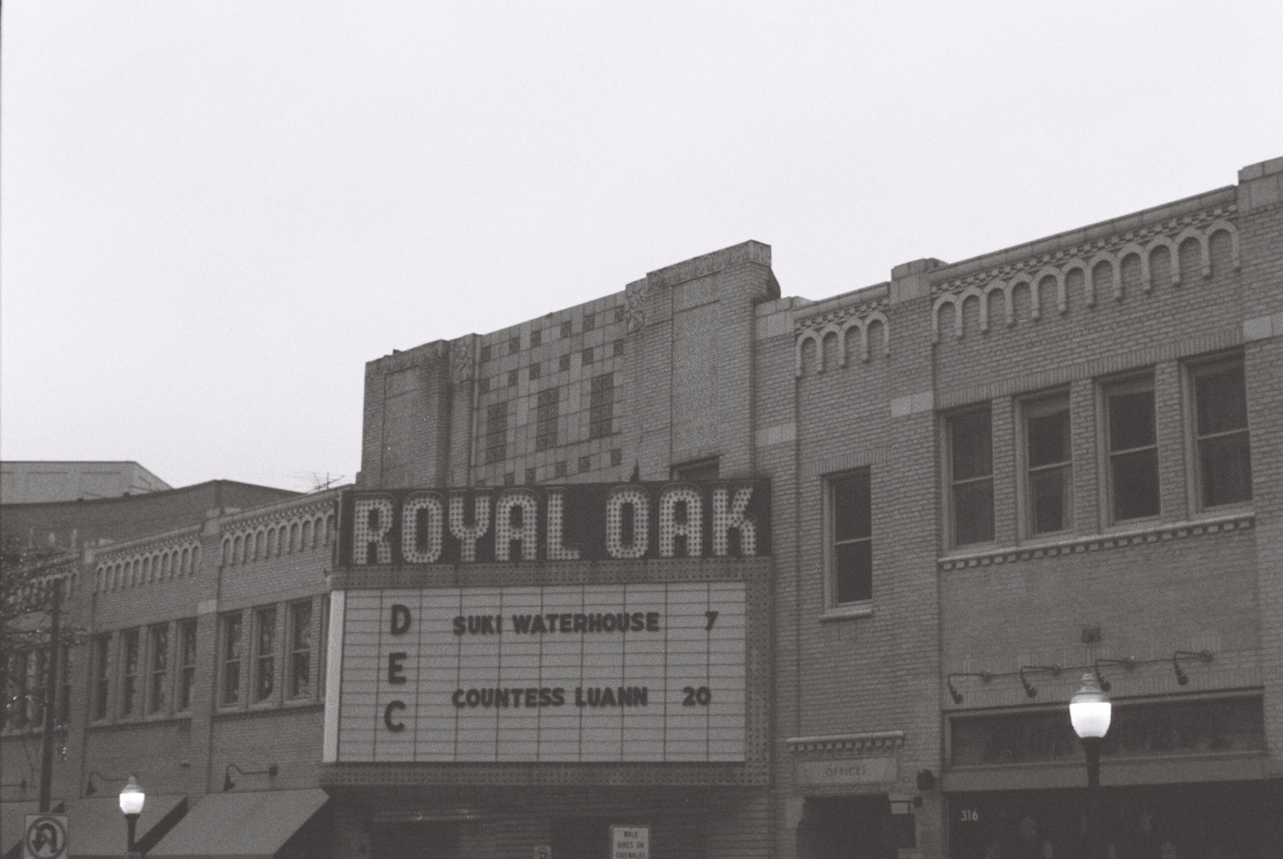 Black and white film photograph of the marquis sign of Royal Oak Music Theater